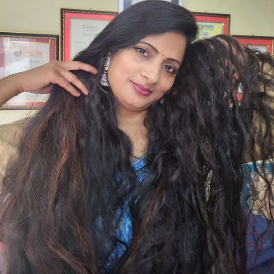 Жінка з волоссям довжиною 236 см розсекретила, що використовує для здоров'я локонів – фото