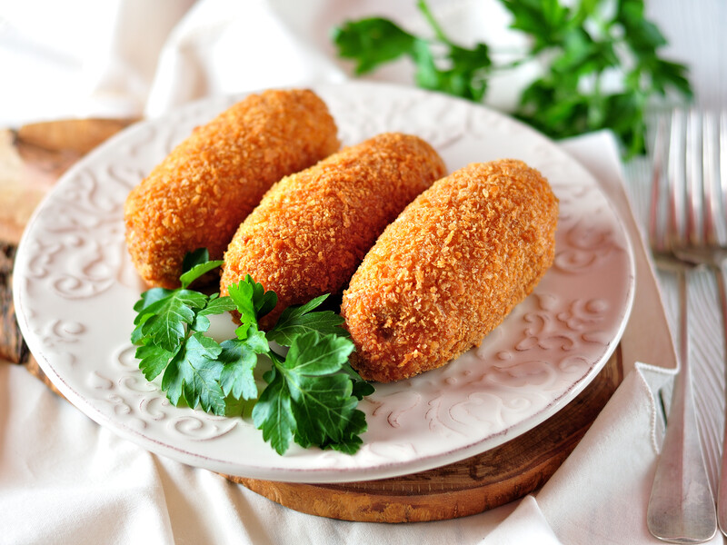 "Чоловік плакатиме від насолоди". Полегшений рецепт соковитих котлет по-київськи з двома видами сиру "Чоловік плакатиме від насолоди". Полегшений рецепт соковитих котлет по-київськи з двома видами сиру
